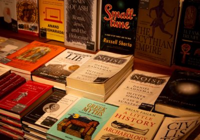 a bunch of books that are on a table